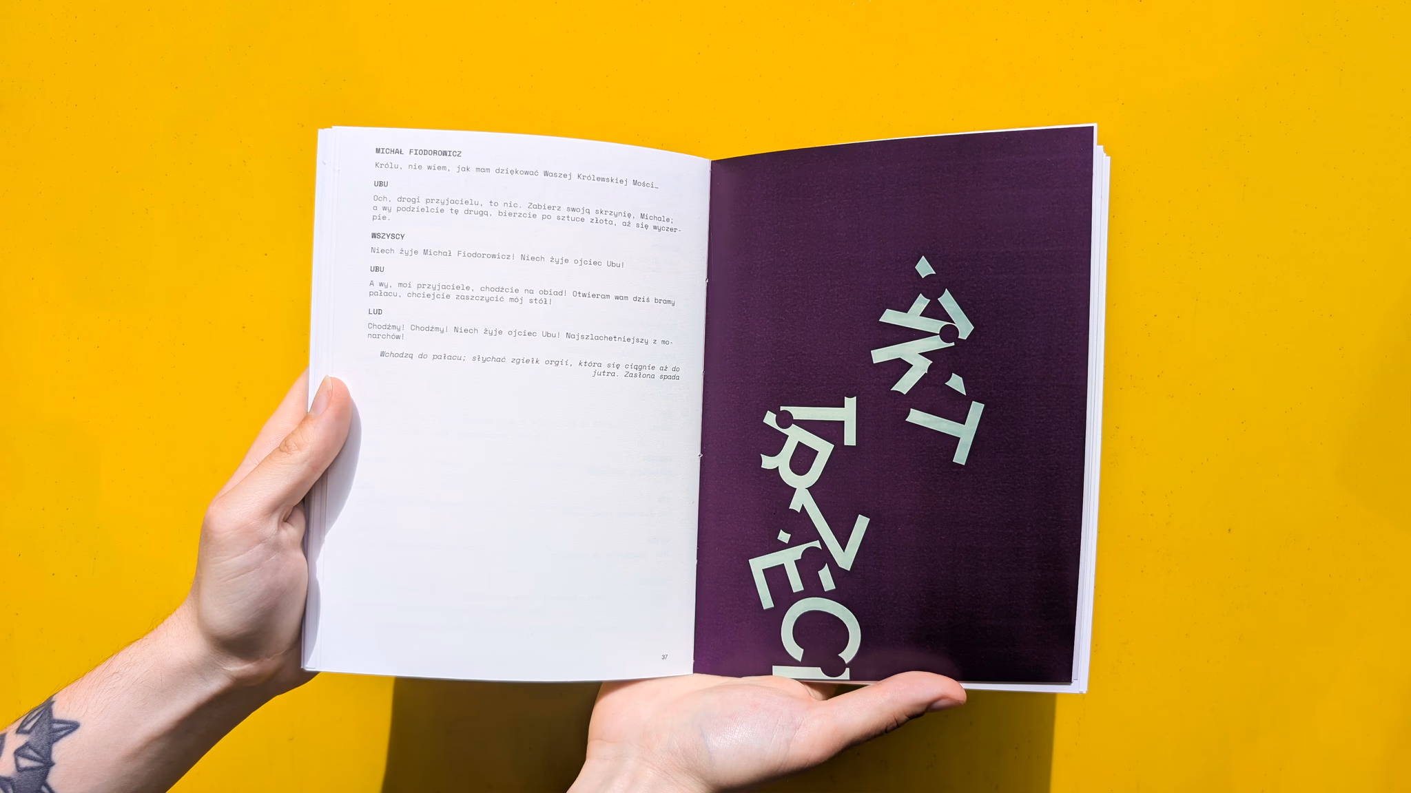Typography breaking apart across a spread